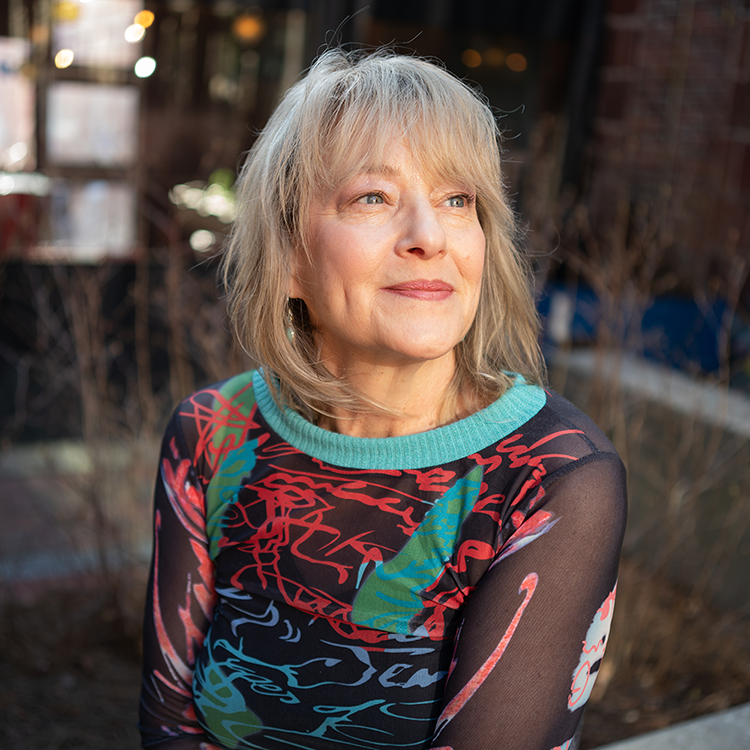 Brenda looking off into the distance with her portrait photography session
