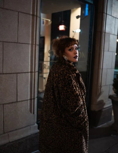 Woman getting portrait downtown Asheville