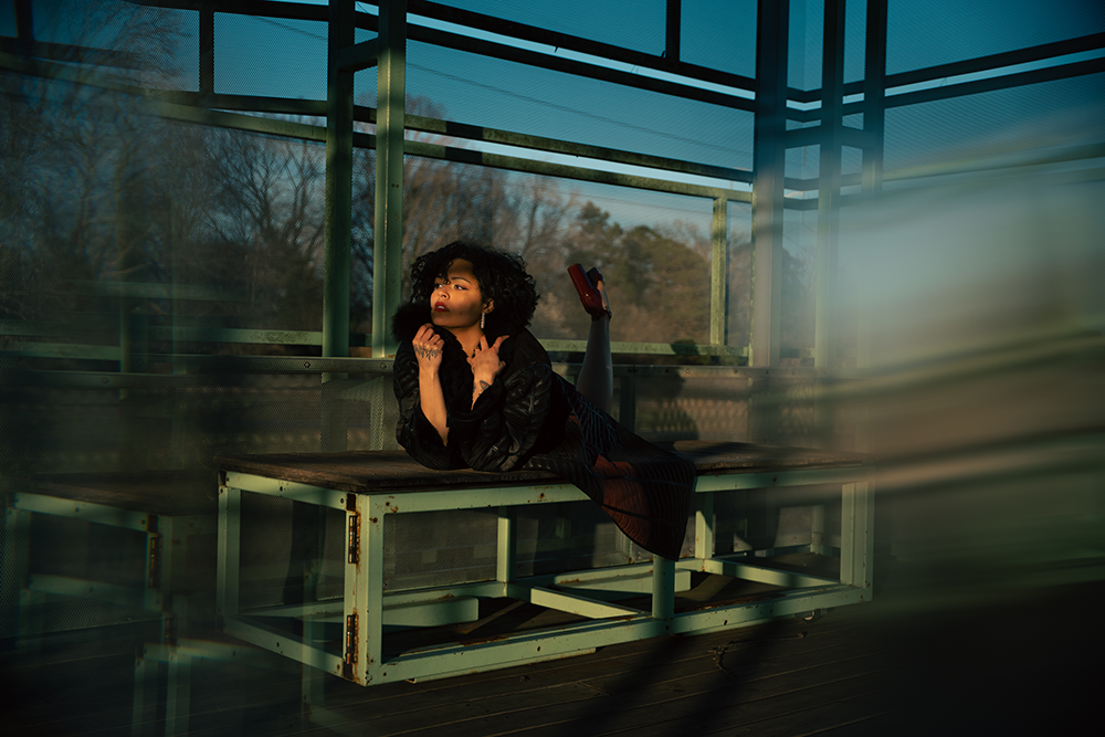 Asheville Portrait Photography lady laying down on bench